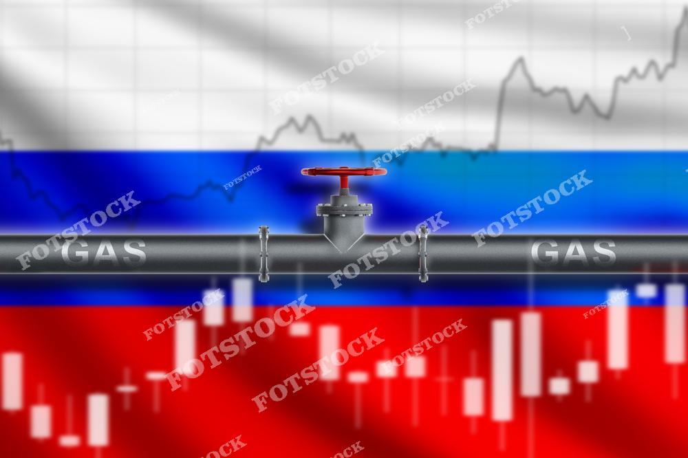 Изображение газовой трубы с вентилем на фоне российского флага и графиков, символизирующее колебания цен на газ и влияние энергетической политики России на международные рынки. Фотография отражает взаимосвязь между ценами на энергоносители и мировой экономикой.